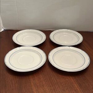 Covington Stoneware Avondale pattern saucers.